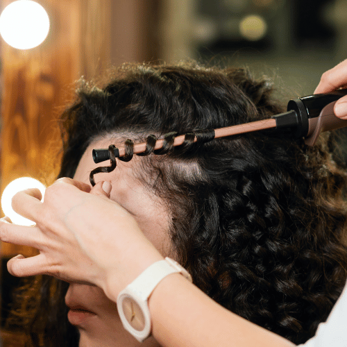 best hair salon in Ahmedabad for hair curling for woman.